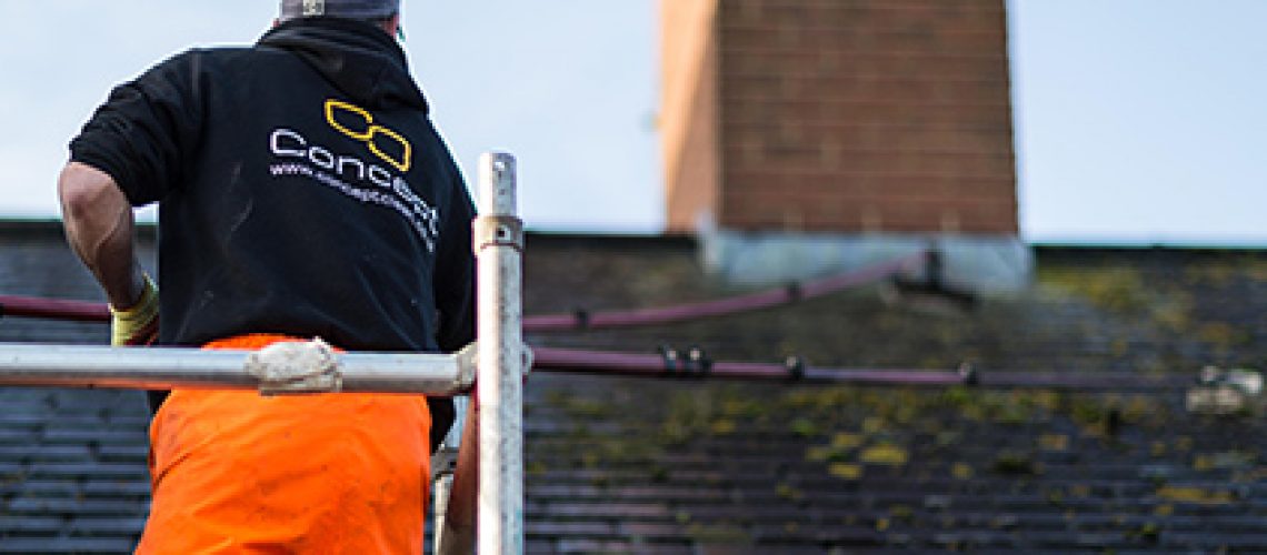 Roof Cleaning Milton Keynes - Scraping A Slate Roof